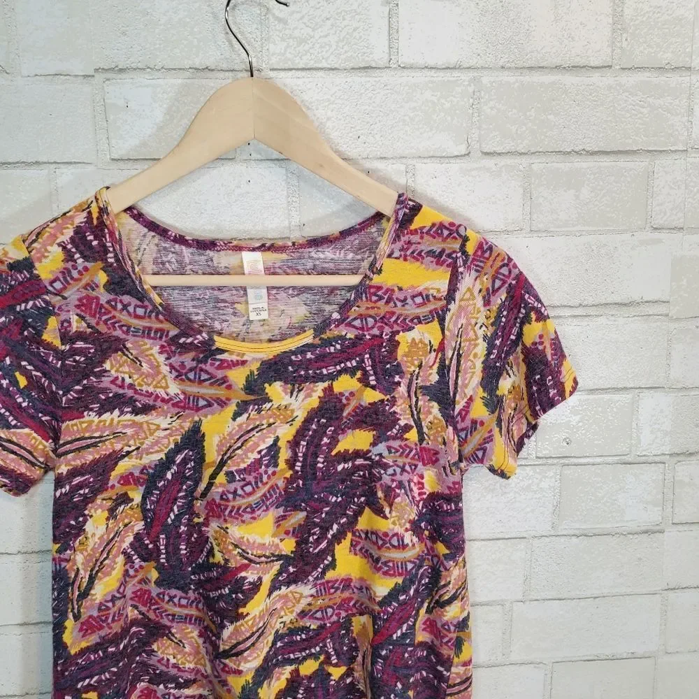 LuLaRoe purple and yellow graphic tee